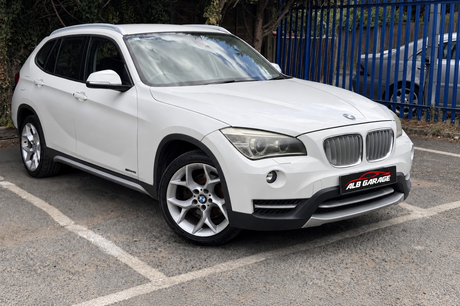 BMW X1 — front three-quarter view
